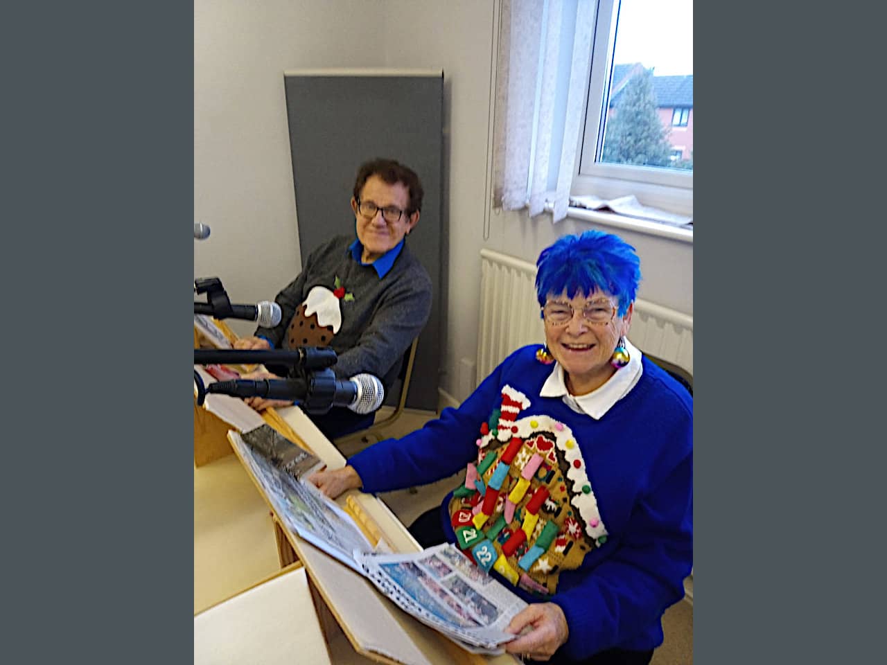 Eric and Viv Jones at the recording studio in Christmas spirit