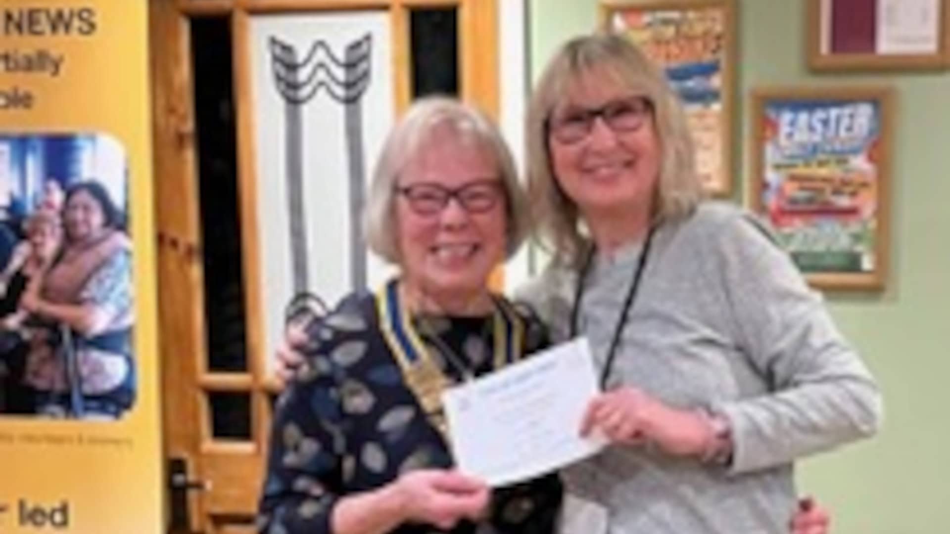 VTN chairman Fran Webb being presented with a cheque